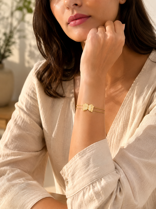 gold plated cz studded anti tarnishbutterfly in center bracelet