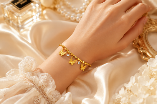 Gold Plated Butterfly Charm Bracelet With Crystal Drops Anti Tarnish Finish Featuring Butterfly Charm Design