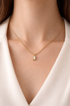 Zarini’s Chunky Gold Chain with White Crystal Pendant