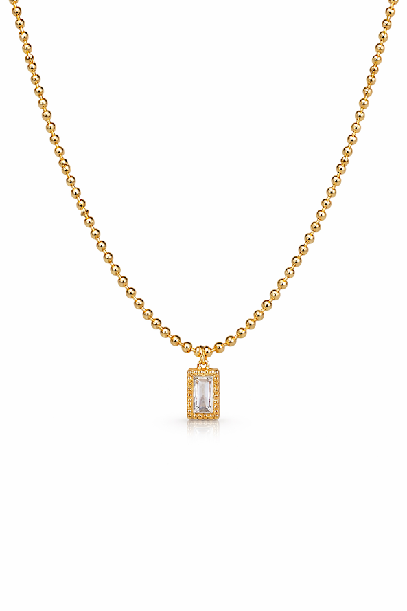 Zarini’s Chunky Gold Chain with White Crystal Pendant