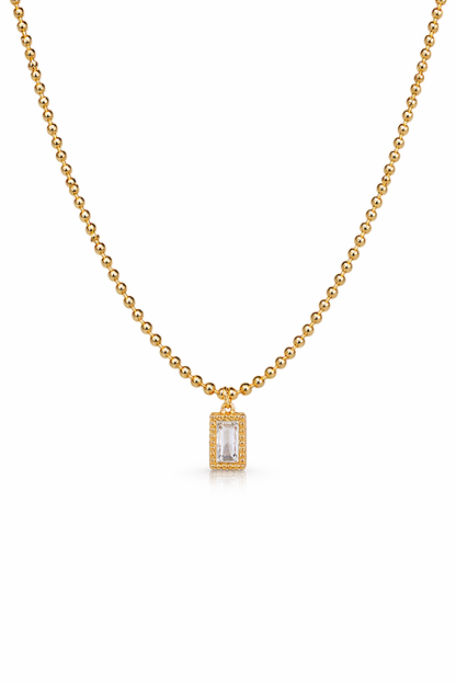 Zarini’s Chunky Gold Chain with White Crystal Pendant