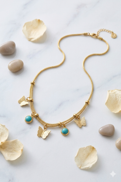 Zarini’s Gold Plated Butterfly & Blue Bead Charm Pendant