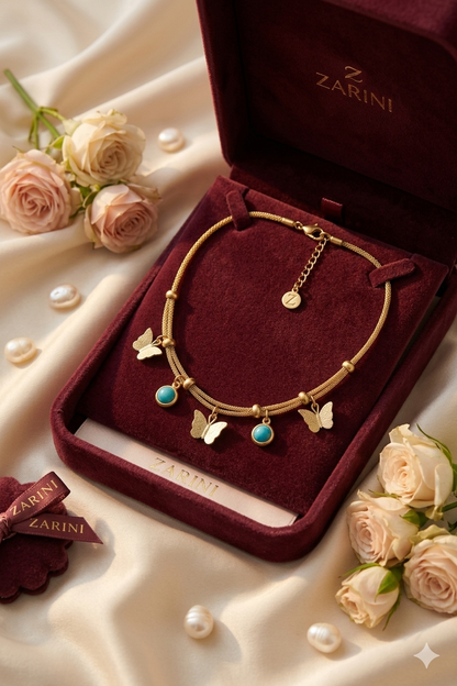 Zarini’s Gold Plated Butterfly & Blue Bead Charm Pendant