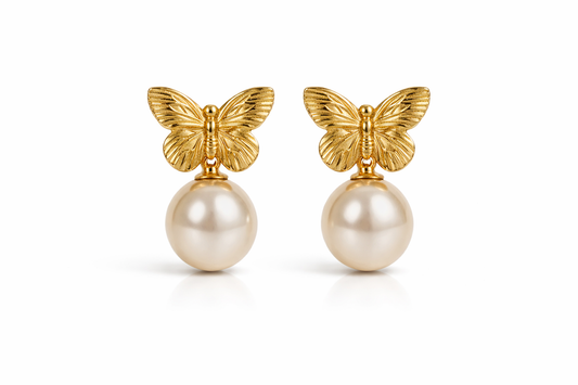Zarini’s pair of gold-toned butterfly pearl drop earrings
