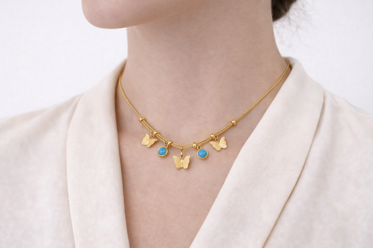 Zarini’s Gold Plated Butterfly & Blue Bead Charm Pendant Necklace