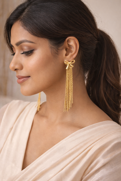 Zarini’s Gold Bow & Tassel Drop Earrings