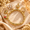 Zarini Gold-Tone Crystal Charm Bracelet for Women | Moon, Dolphin & Floral Charms