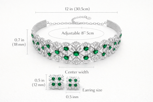 Jewelry set with emerald green stones and measurements on a white background