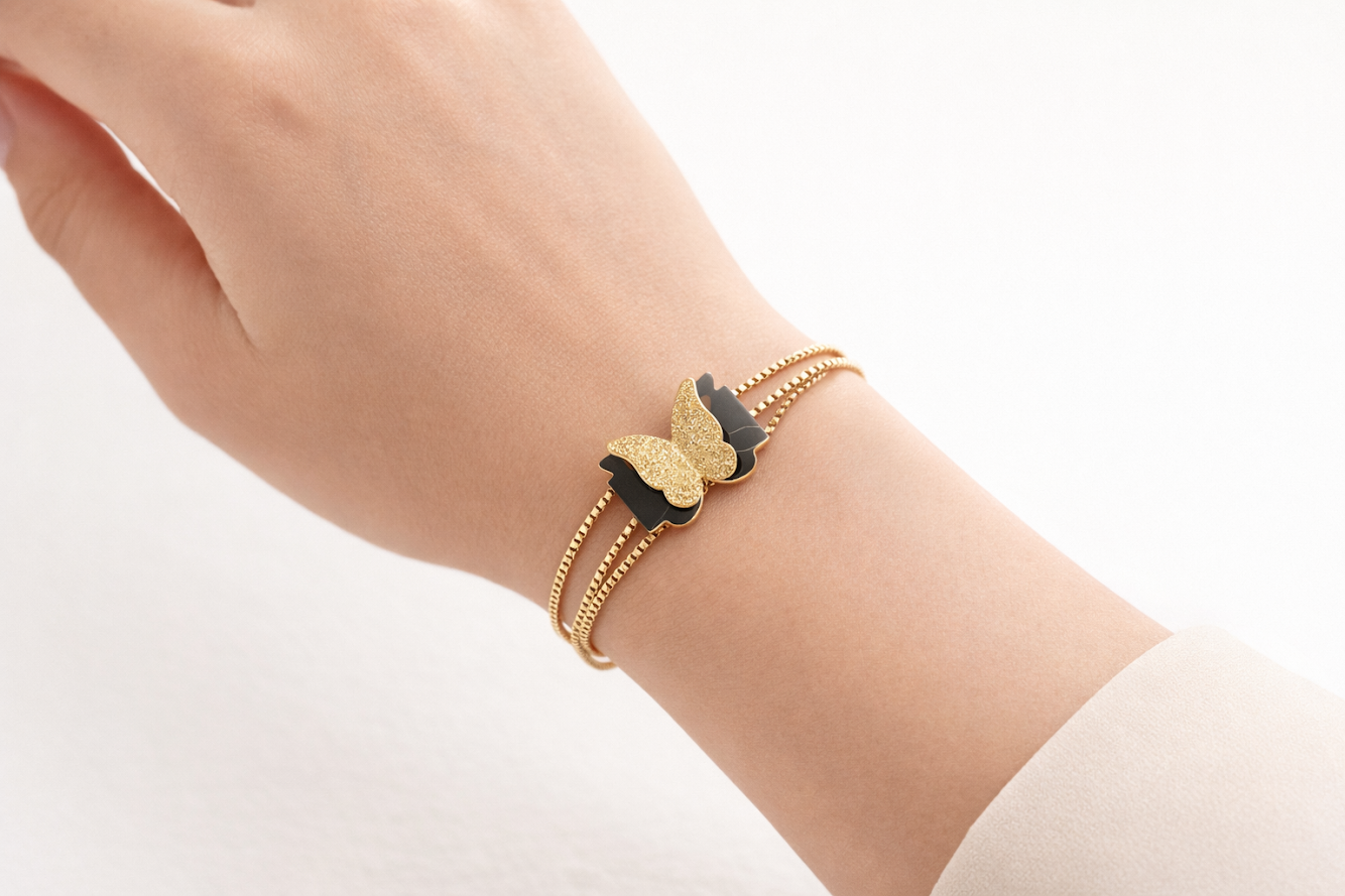 gold plated cz studded anti tarnishbutterfly in center bracelet