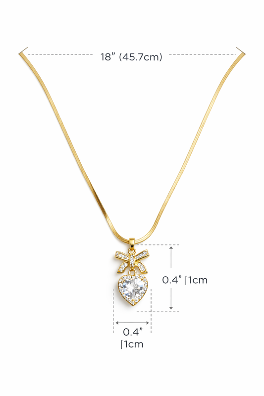 Crystal Heart Pendant With Decorative Bow Design