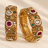 Zarini Antique Gold-Toned Kundan Kada Bangles with Ruby, Emerald & Pearl Detailing – Set of 2