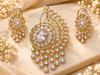 ZARINI Floral Majesty Gold-Toned Pendant and Chandelier Earrings Set
