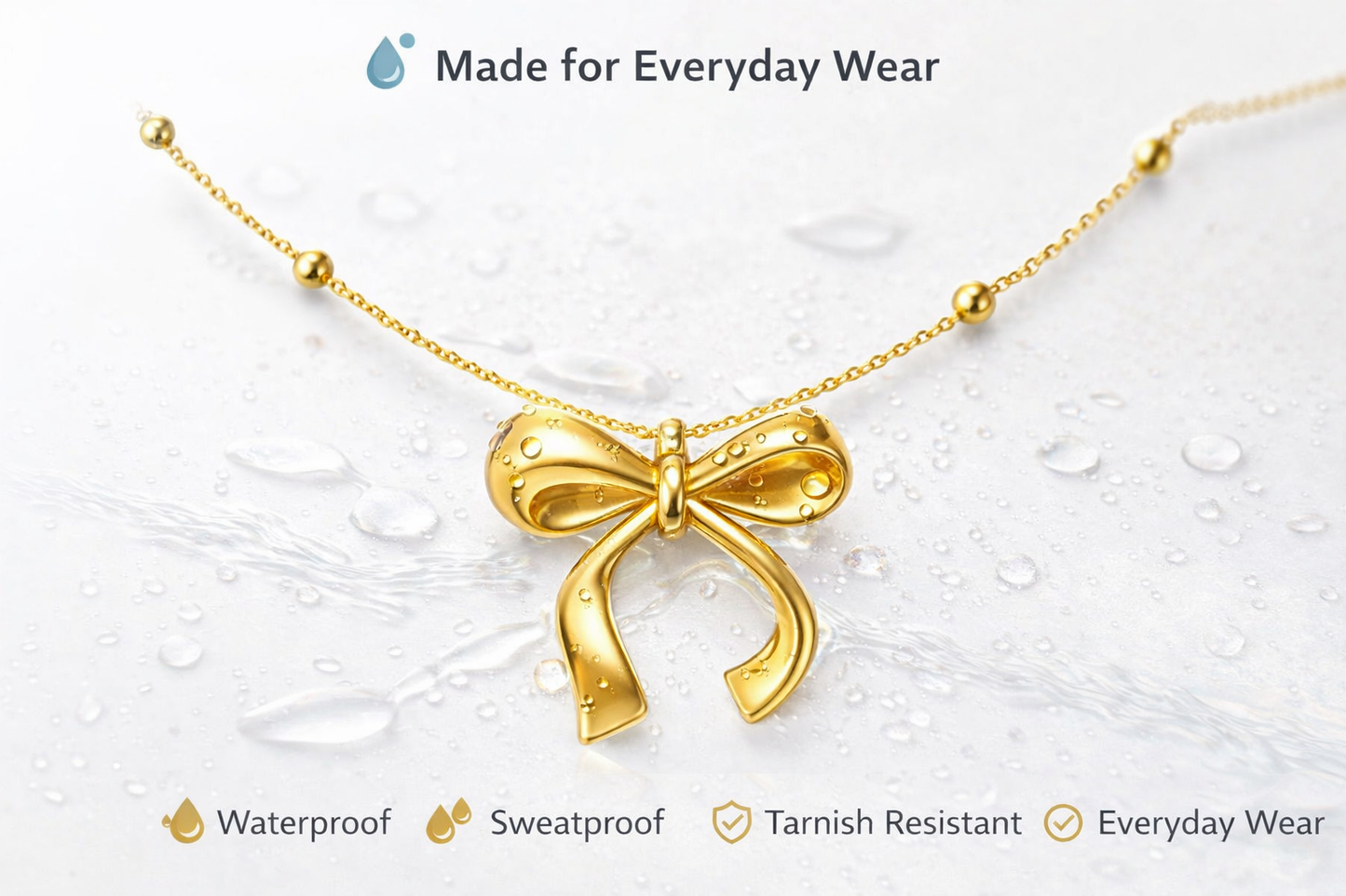 Zarini’s Gold Bow Pendant