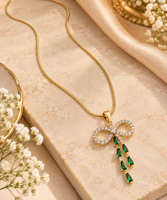Zarini Emerald Green Bow Pendant Necklace for Women | Crystal Gold-Tone Jeweller