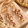 Zarini Gold-Tone Crystal Leaf Drop Earrings | Two-Tone Statement Dangles