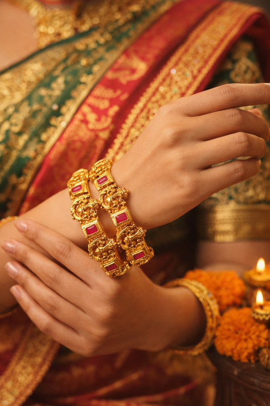 Zarini Gold-Toned Lord Ganesha Temple Kada Bangles with Ruby-Coloured Stones – Set of 2